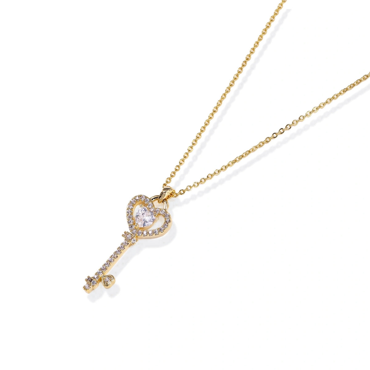 Secret Heart Key Necklace, close-up of the pave zirconia heart bow and key shaft
