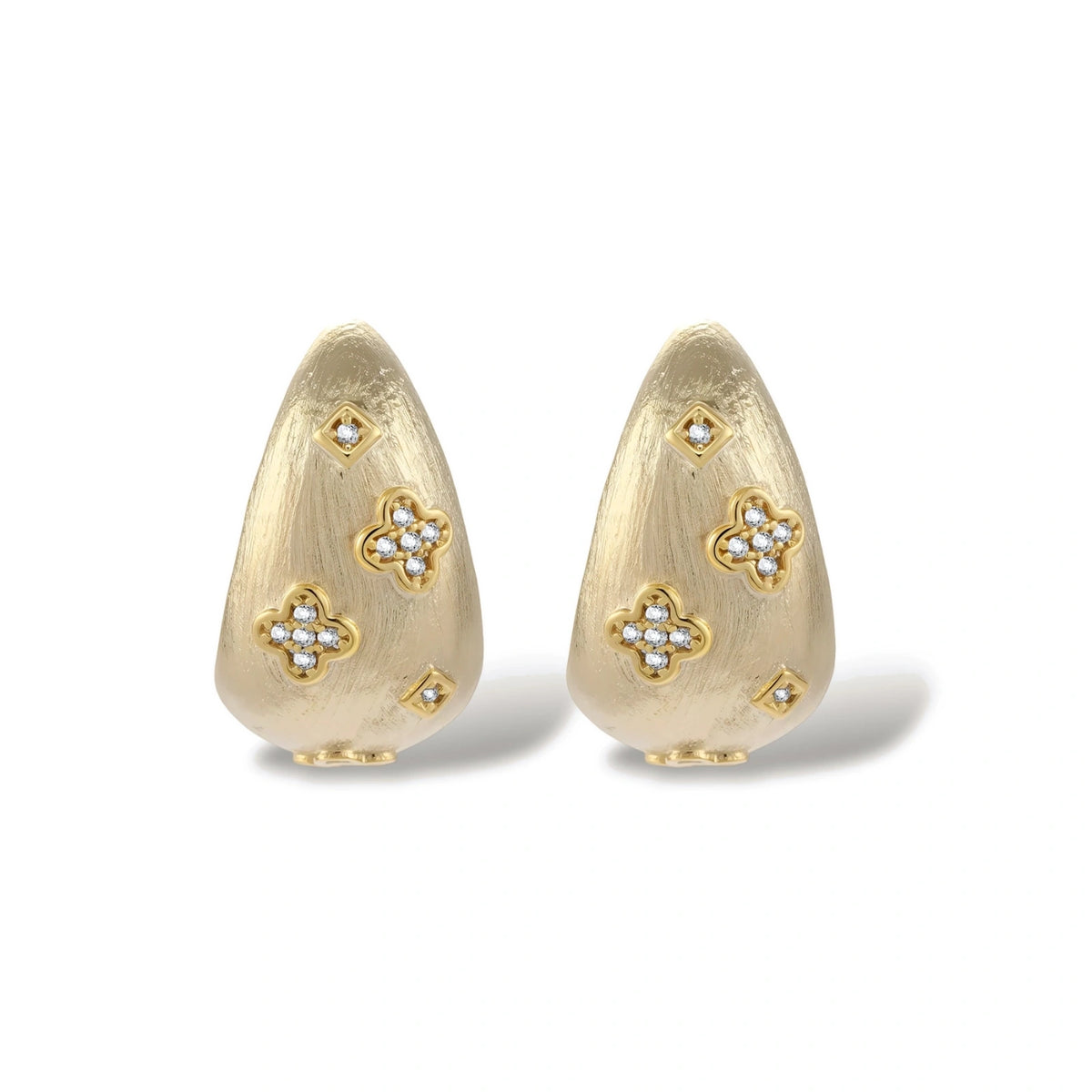 Clementine Clover Teardrop Earrings, close-up of the clover and zirconia detail