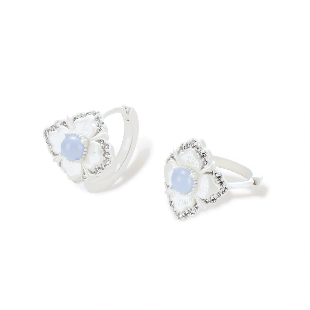 Fiora Mismatched Flower Earrings, close-up of pale blue center stone