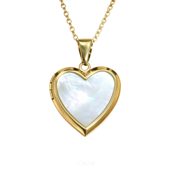 Gold heart locket necklace open to show photo space, white background