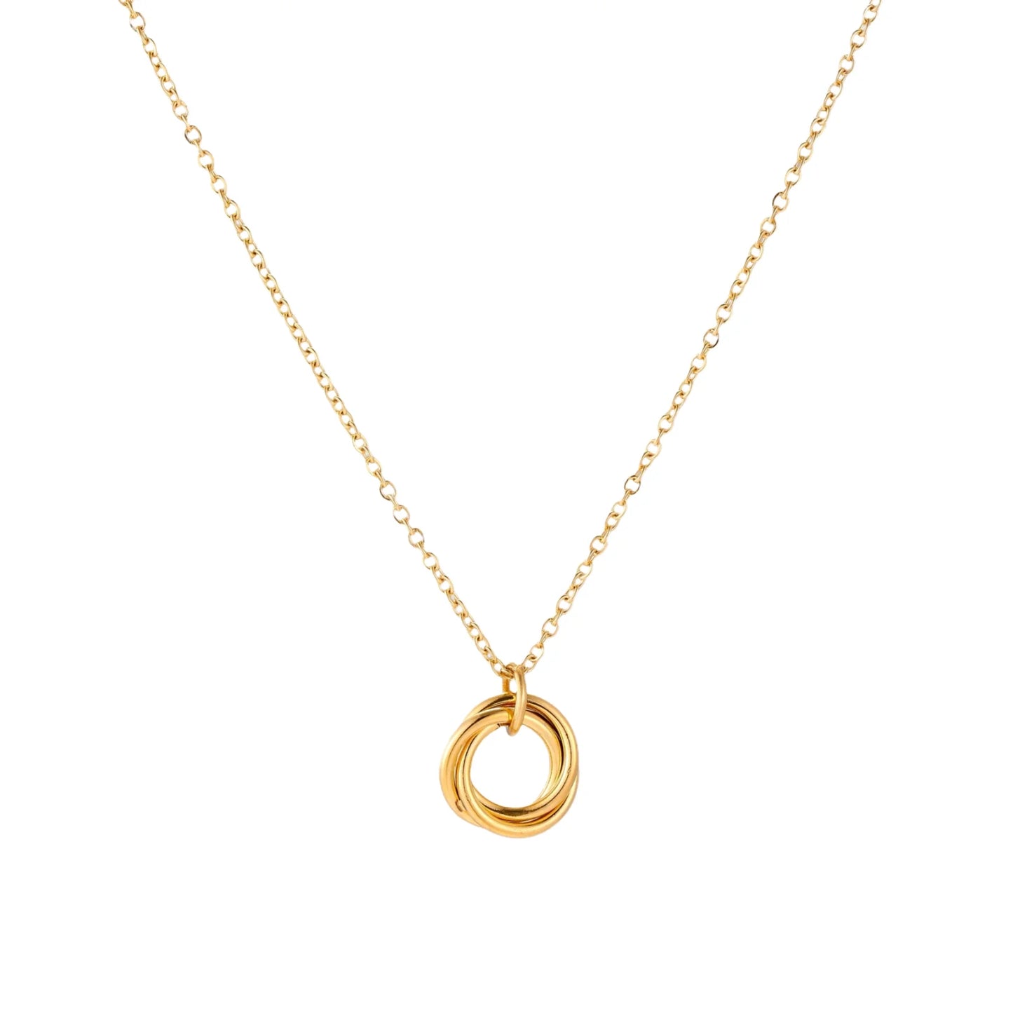 Gold necklace with a circular pendant on a white background