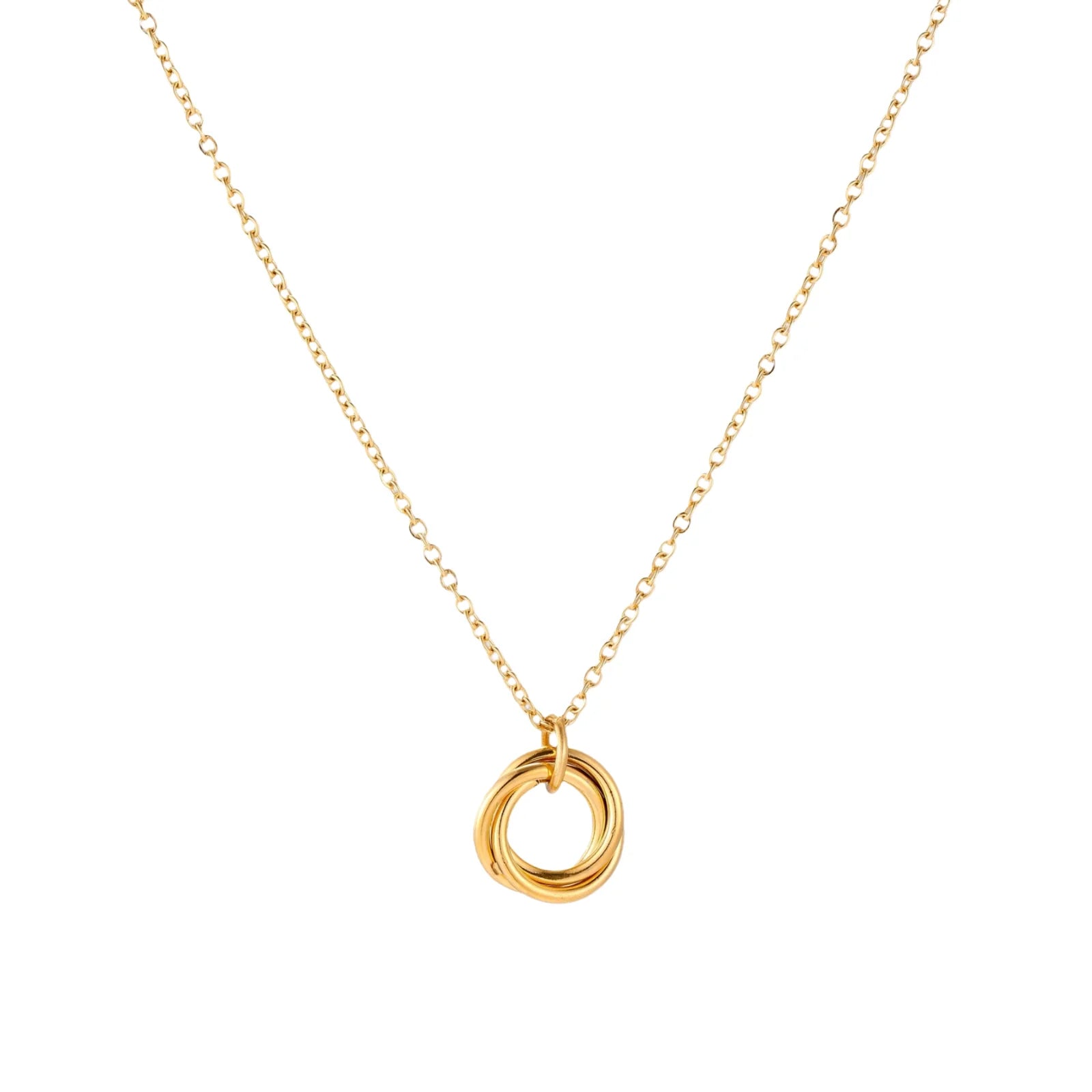 Gold necklace with a circular pendant on a white background