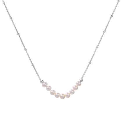 Pearl necklace on a white background