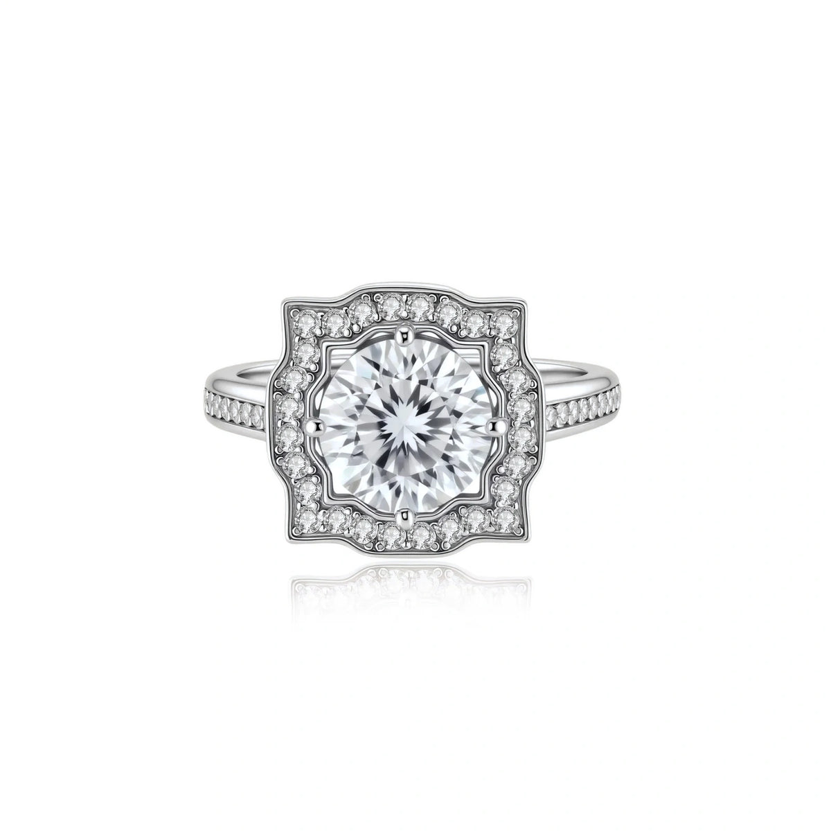 Adele Crown Moissanite Ring, front view of the round moissanite inside a scalloped pavé halo