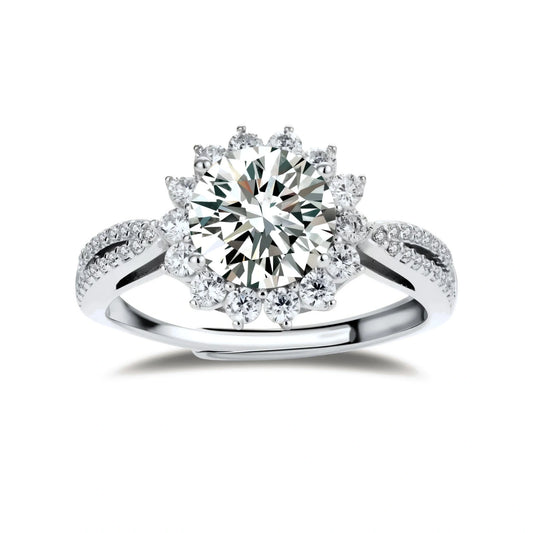 Rosalie Sunburst Moissanite Ring, front view of the round moissanite in a sunburst halo on a pavé split band