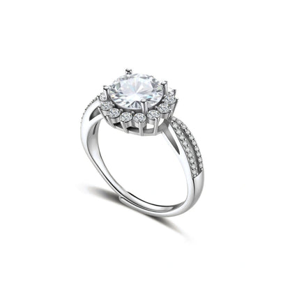 Rosalie Sunburst Moissanite Ring, angled view showing the halo, split shoulders and open adjustable band