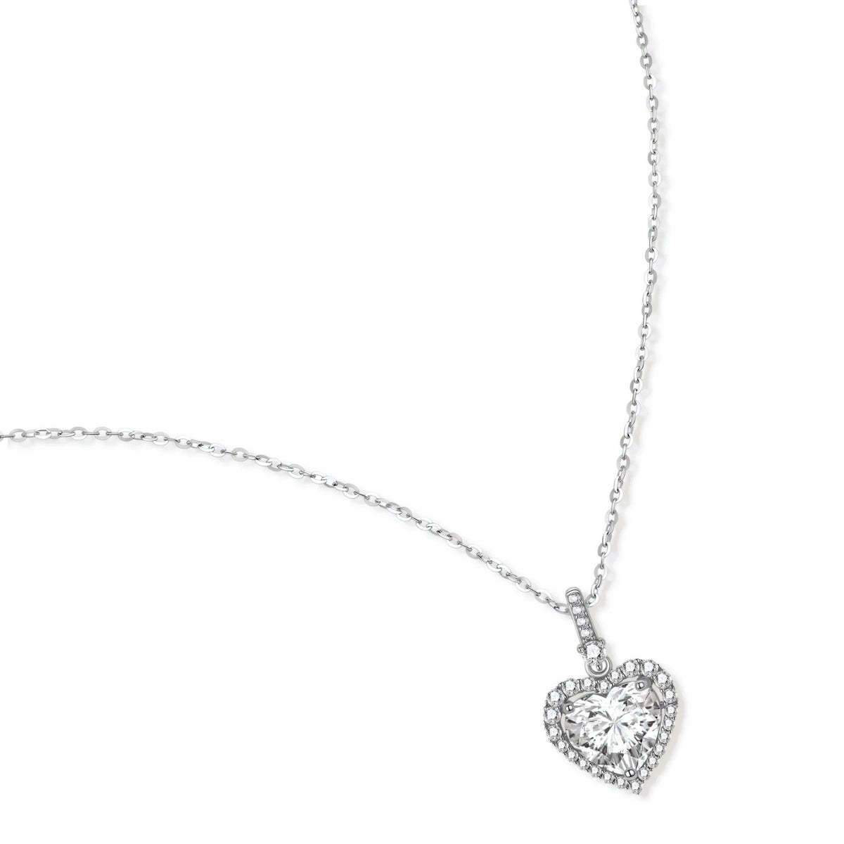 Sofia Heart Moissanite Necklace, pendant and chain laid at an angle showing the halo and bail