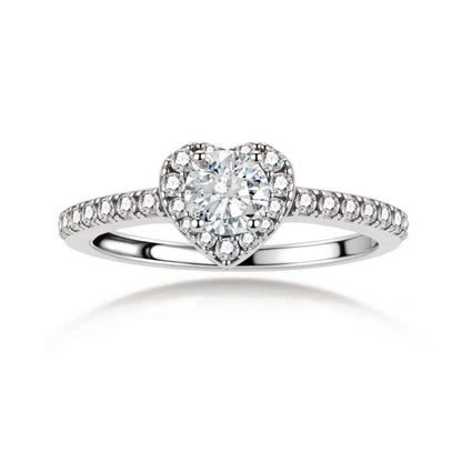 Nina Heart Halo Moissanite Ring, front view of the round moissanite inside a heart-shaped pavé halo with pavé shoulders