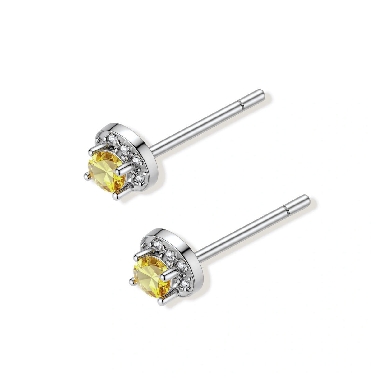 Maeve Yellow Moissanite Halo Studs, pair angled showing the four-prong settings and post backs