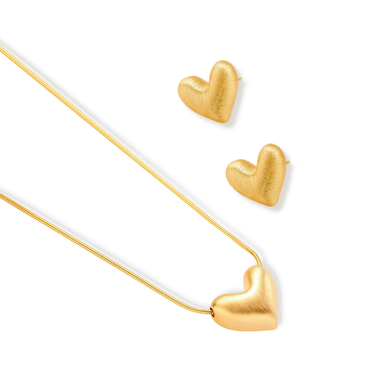 Golden Heart Necklace detail, brushed heart pendant with adjustable chain