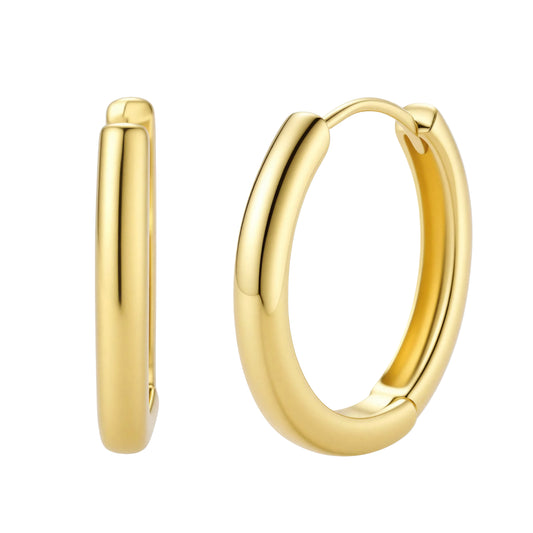 Gold hoop earrings on a white background