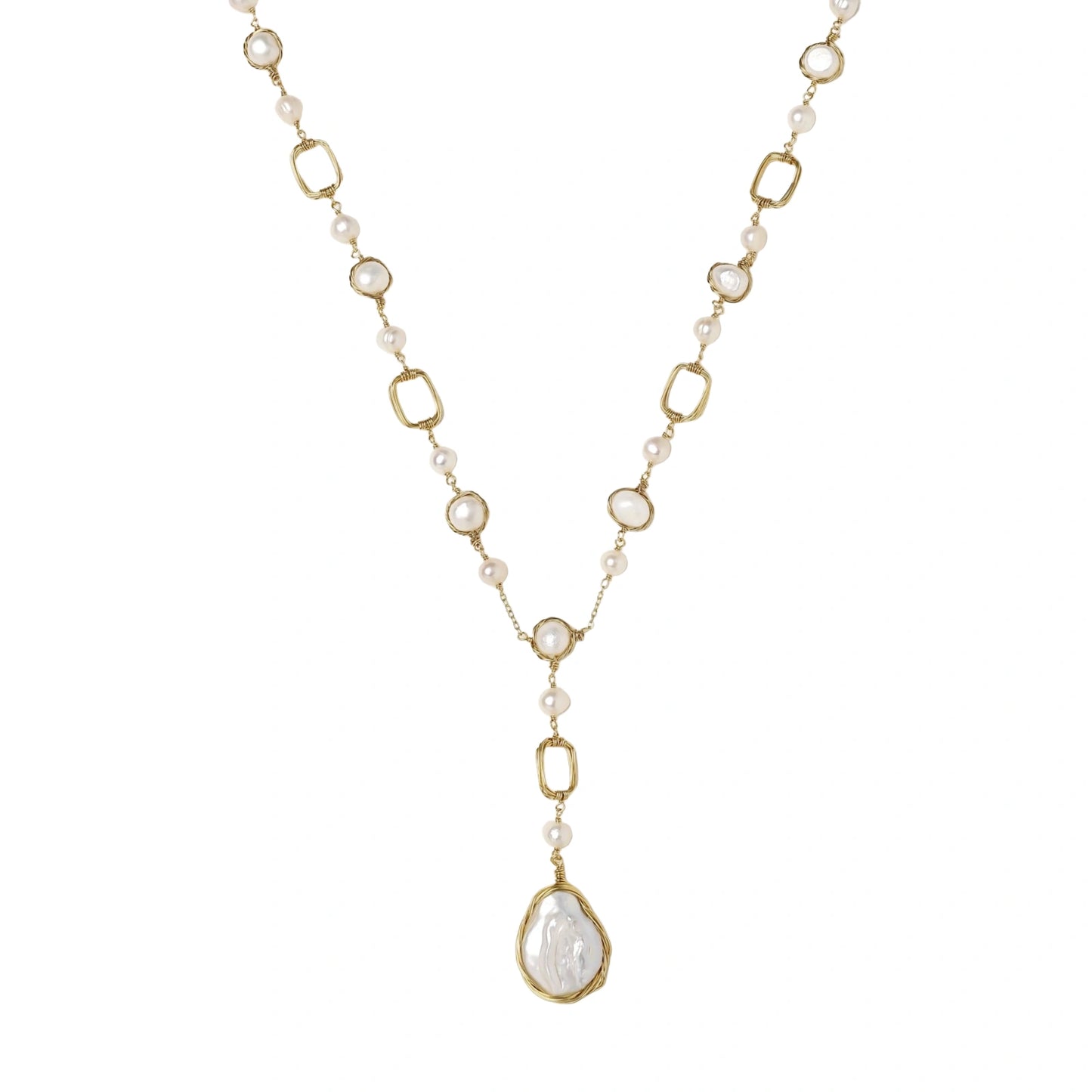 Necklace with gold and pearl chain on a white background