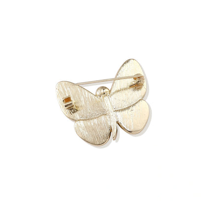Rainbow Butterfly Brooch, close-up of the pave crystal body and pin back