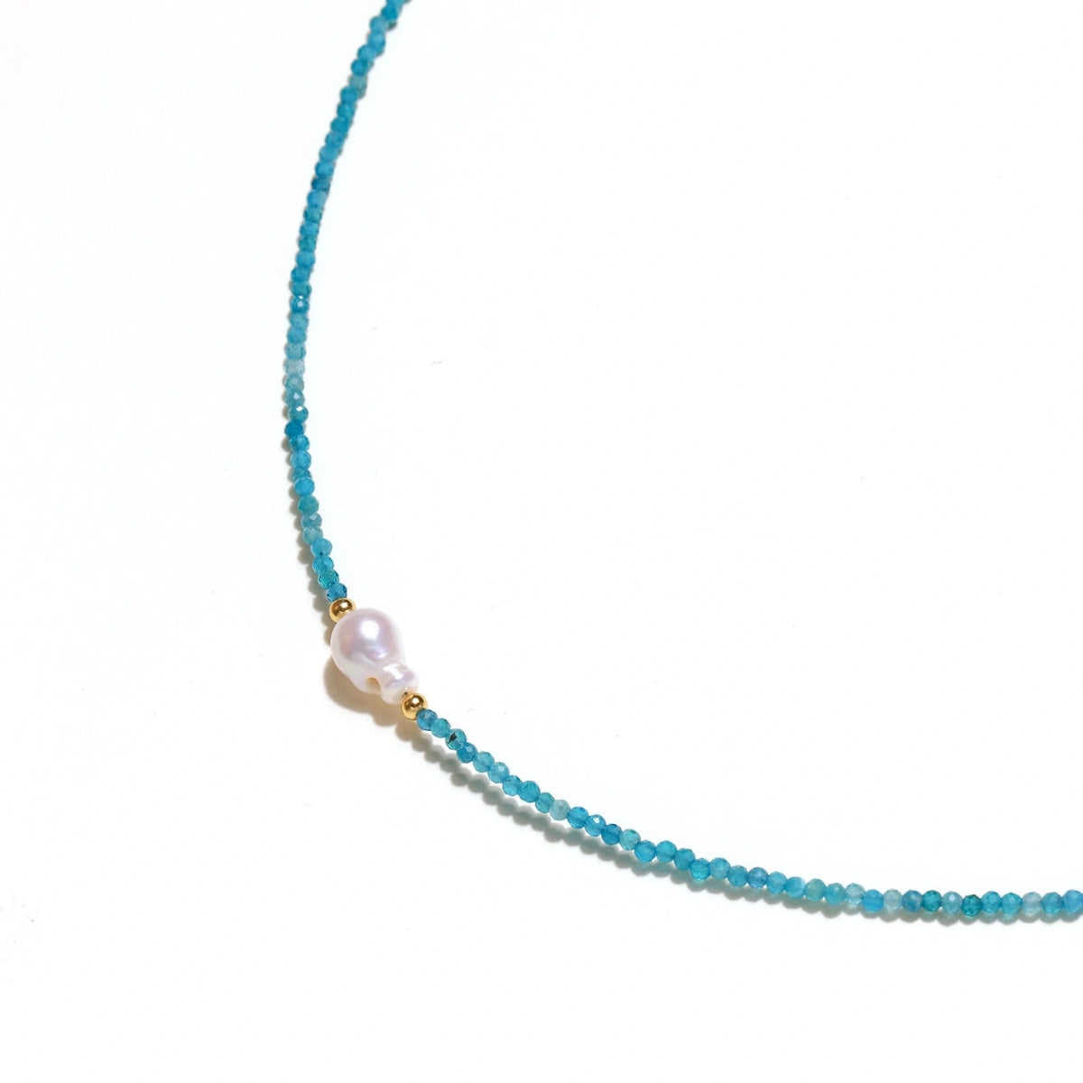Skye Apatite Pearl Necklace, close view of the centre pearl on the apatite strand