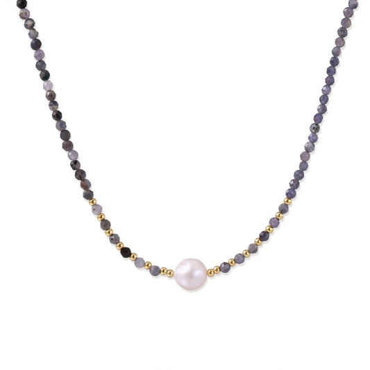 Thea Iolite Pearl Necklace, strand of faceted blue-grey iolite beads with a single white freshwater pearl and gold spacer beads, front view