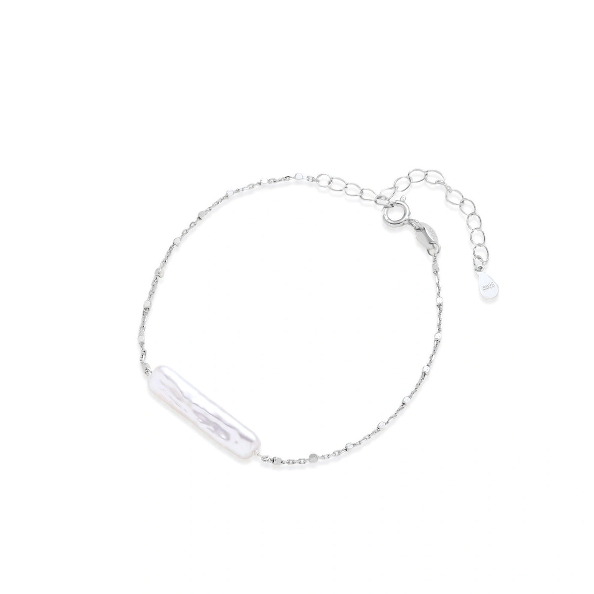 Noor Pearl Bar Bracelet, fine silver chain bracelet with a single elongated white pearl, laid flat in a circle showing the spring-ring clasp and extender