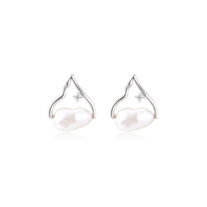 Willa Pearl Arch Earrings, pair side by side showing the peaked arch frames above the pearls