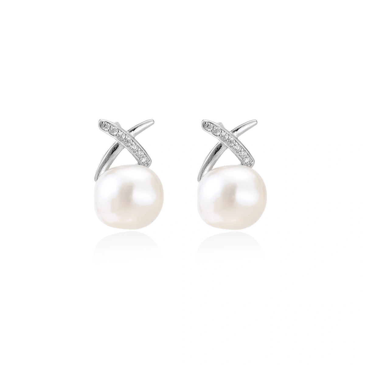 Ivy Crossover Pearl Studs, pair of crossover pearl studs side by side, front view