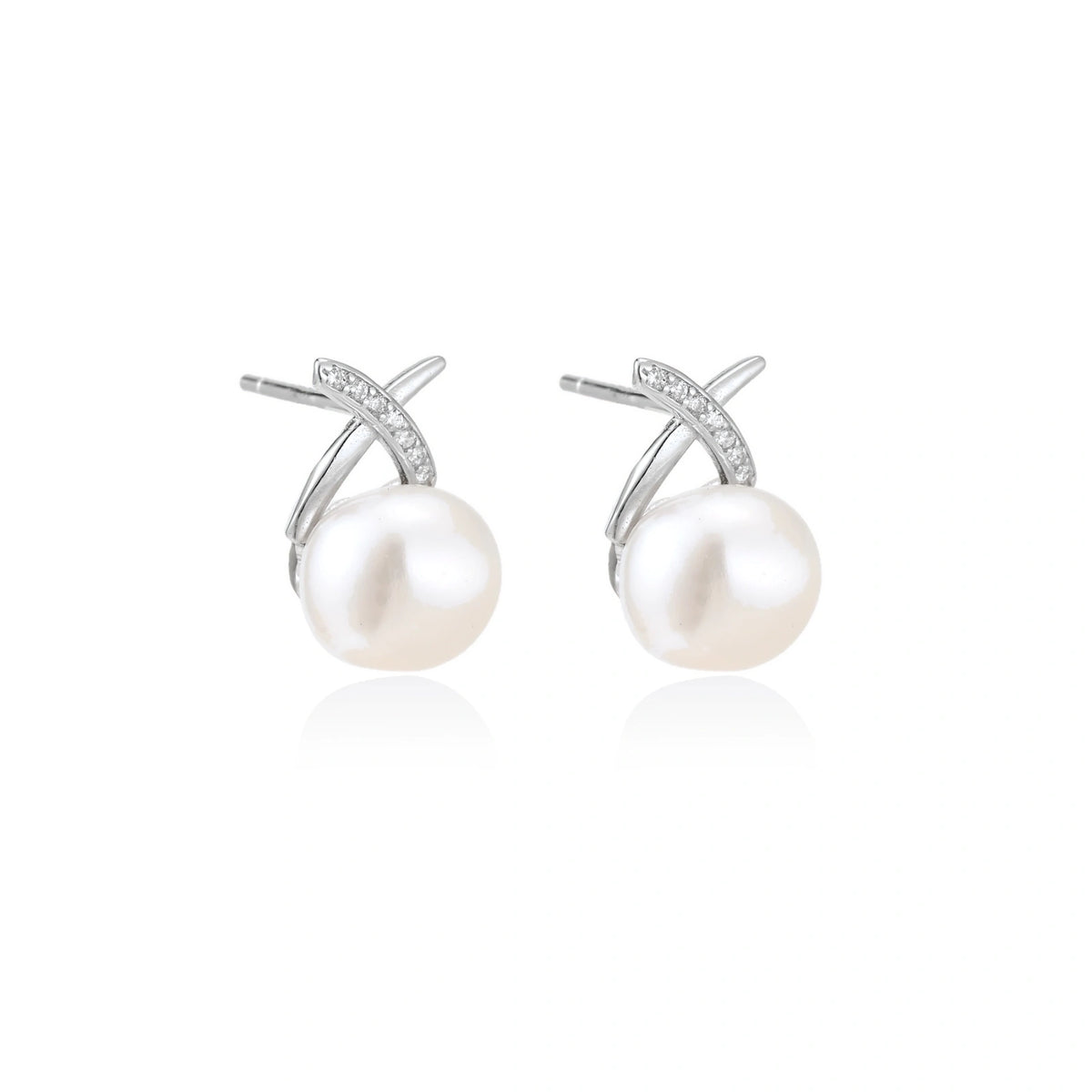 Ivy Crossover Pearl Studs, pair angled to show the stone-set arm and post backs