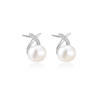 Ivy Crossover Pearl Studs, pair angled to show the stone-set arm and post backs