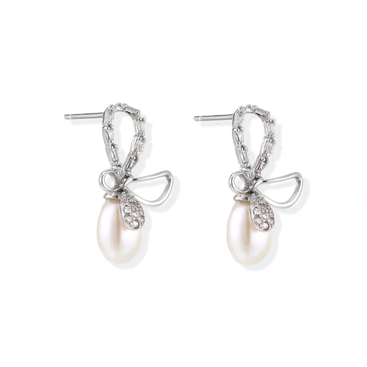 Bettina Bow Pearl Drops, pair angled to show the stone-set bow loop, the polished loop and the post backs