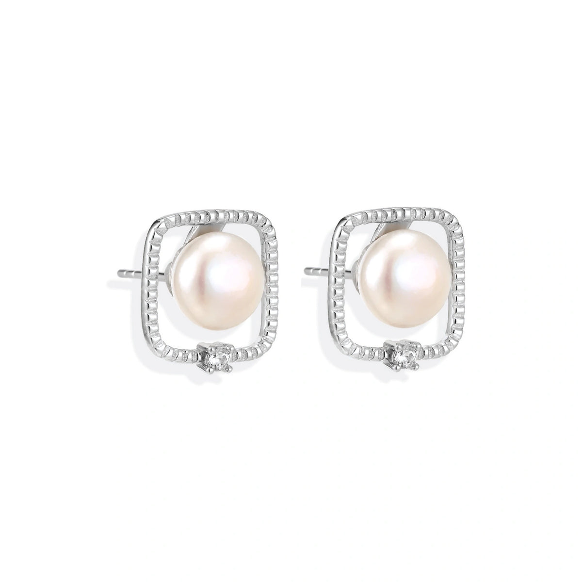 Greta Pearl Frame Studs, pair side by side showing the textured open frames