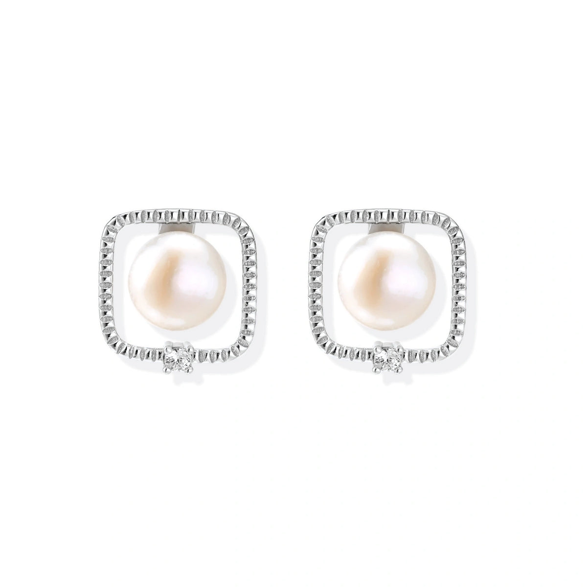 Greta Pearl Frame Studs, pair front-on showing the pearl inside each frame and the small corner stone