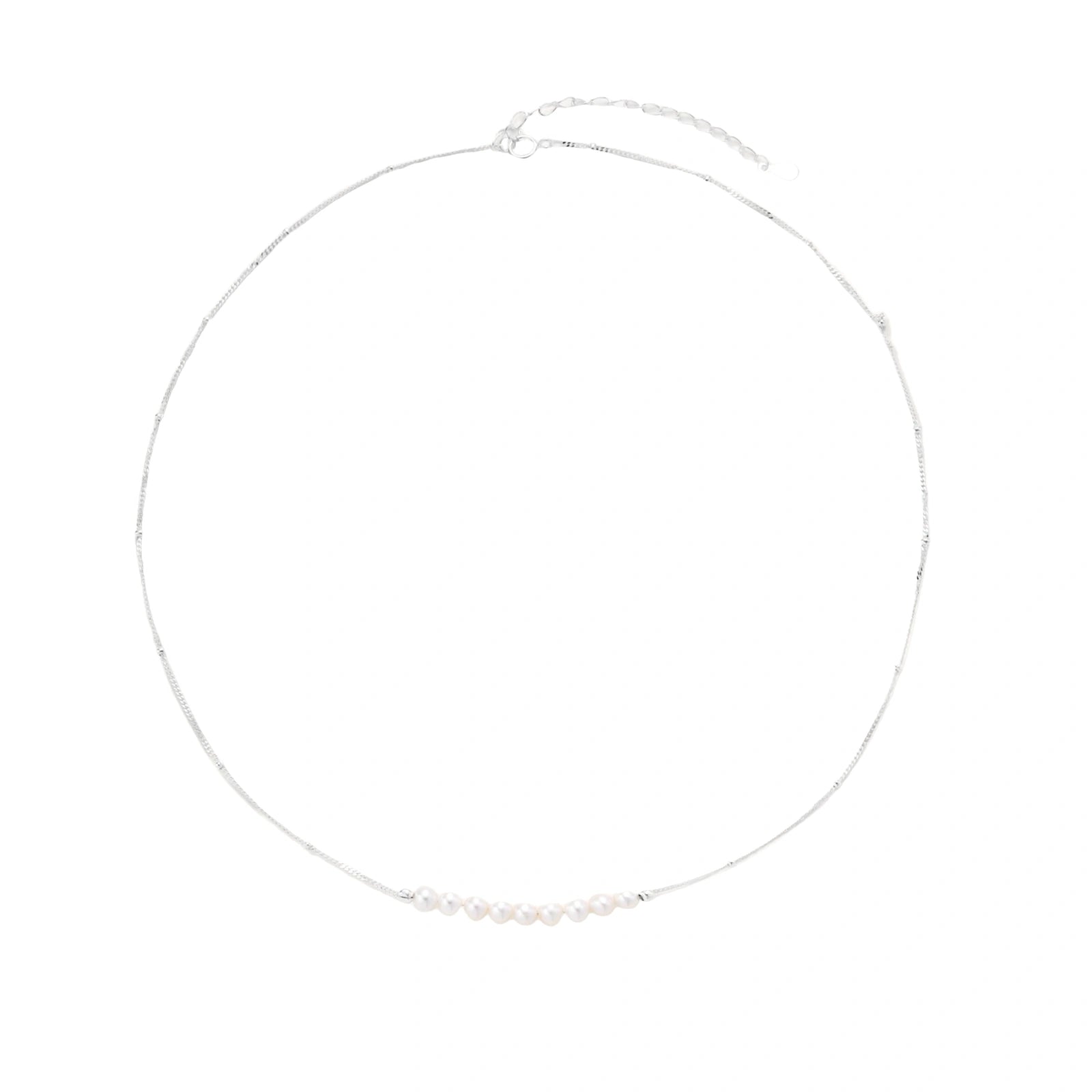 Silver necklace with small pearls on a white background