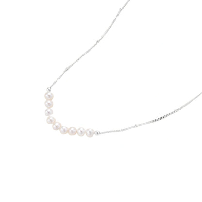 Pearl necklace on a white background