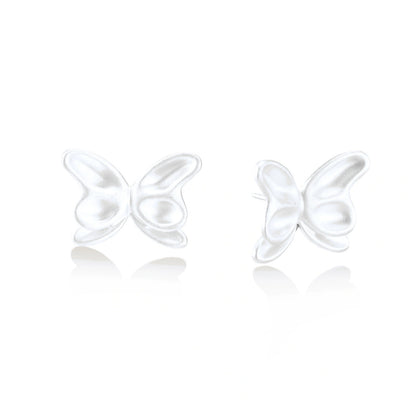 Sylvie Butterfly Studs, pair of matte sterling silver butterfly stud earrings, one front-on and one turned to show the post