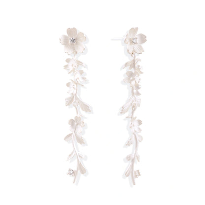 Isla Vine Drop Earrings, pair of matte sterling silver flower-and-vine drop earrings, front view