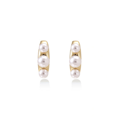 Pearl Trio Curve Studs - close-up detail view
