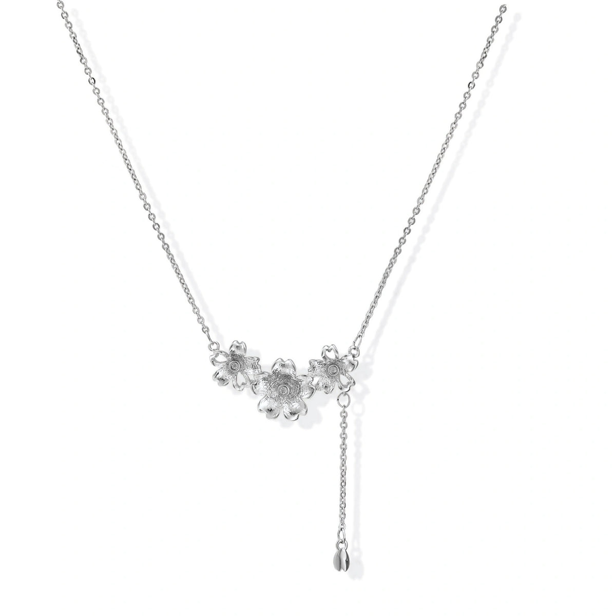 Silver Bloom Lariat necklace in white gold plated brass with sculpted flower blossoms