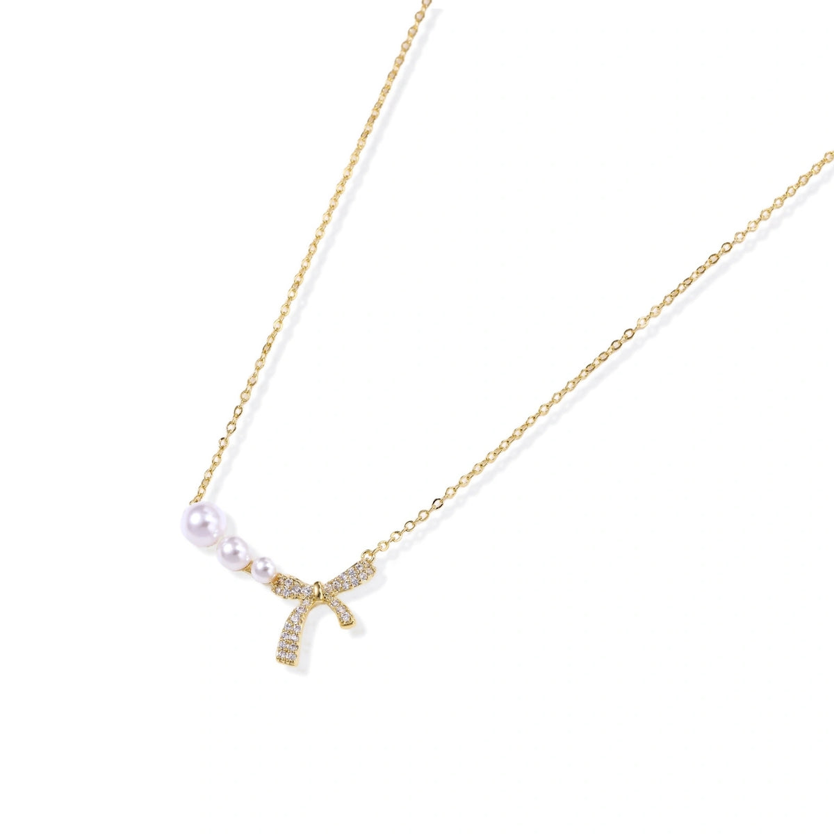 Pearl Bow Dreams Necklace - close-up detail view