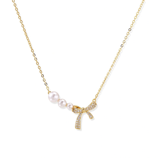 Pearl Bow Dreams Necklace - 14K Gold Plated Brass with freshwater pearls and pavé crystal bow, front view