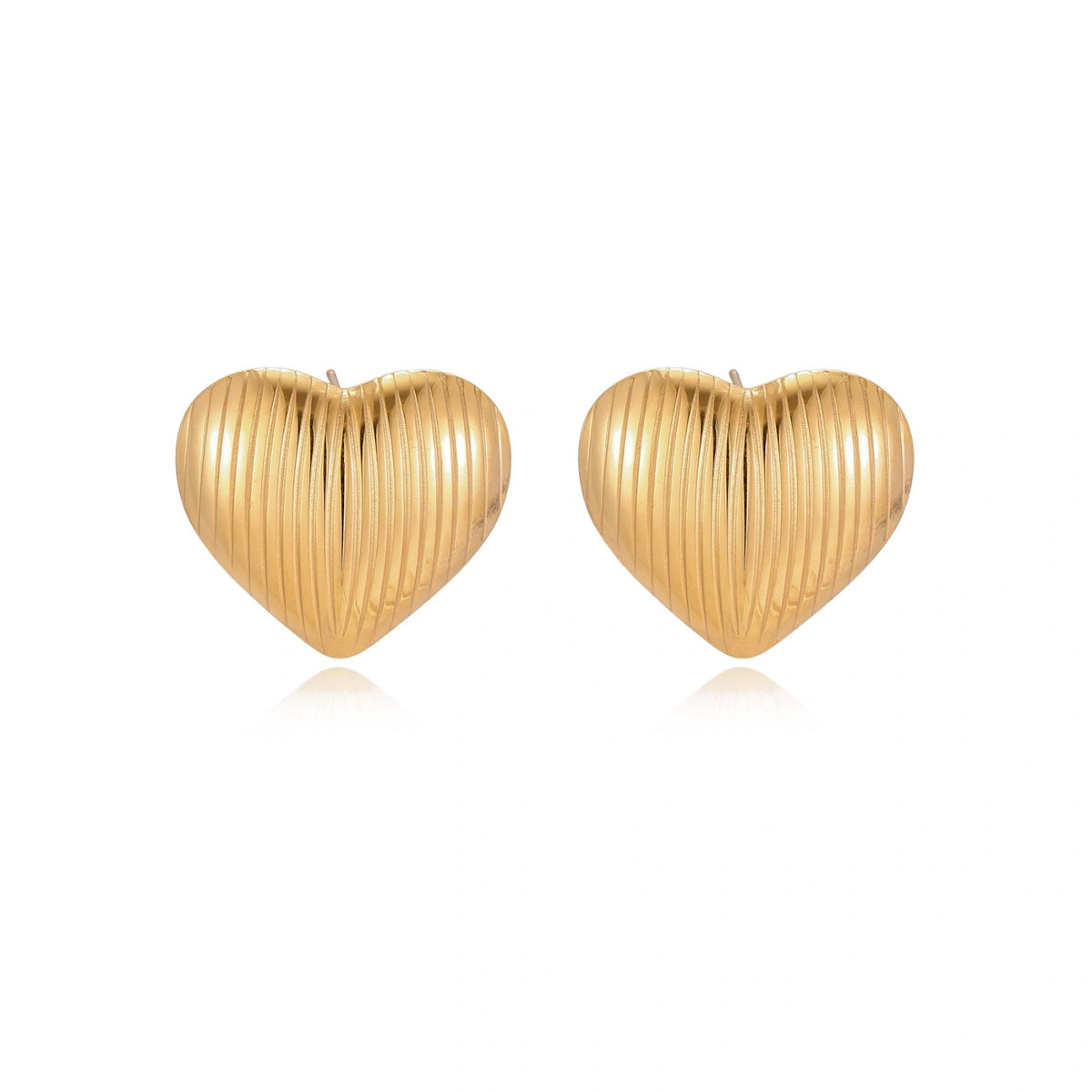 Textured Heart Stud Earrings side view showing domed ribbed surface