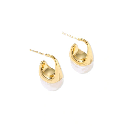 Sculptural Cone Hoops - pair on surface