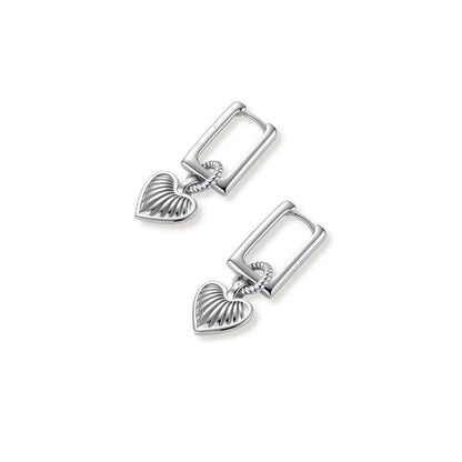 Ada Heart Huggies, pair lying flat, angled from above, showing the rectangular hinged huggie and ribbed heart charms