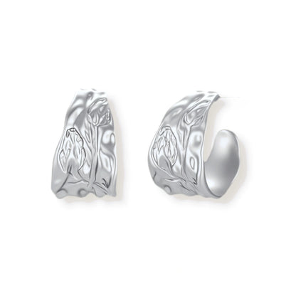 Marguerite Floral Hoops, silver-tone textured hoops with etched tulip motif, front view