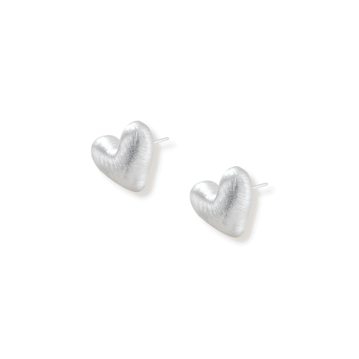 Hazel Silver Heart Studs, pair lying flat showing the post backs