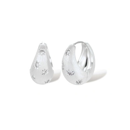 Guinevere Star Hoop Earrings, silver-tone zirconia star hoops, front view
