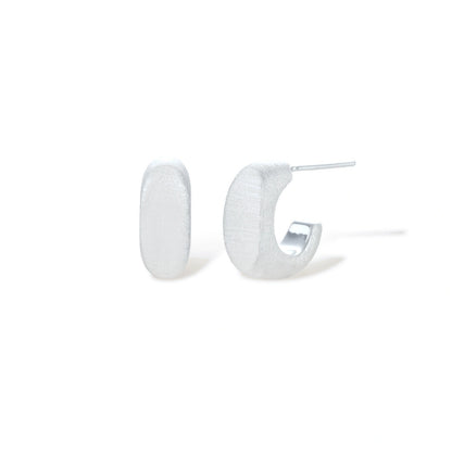 Perrine Silver Huggie Earrings, silver-tone huggie earrings, front view