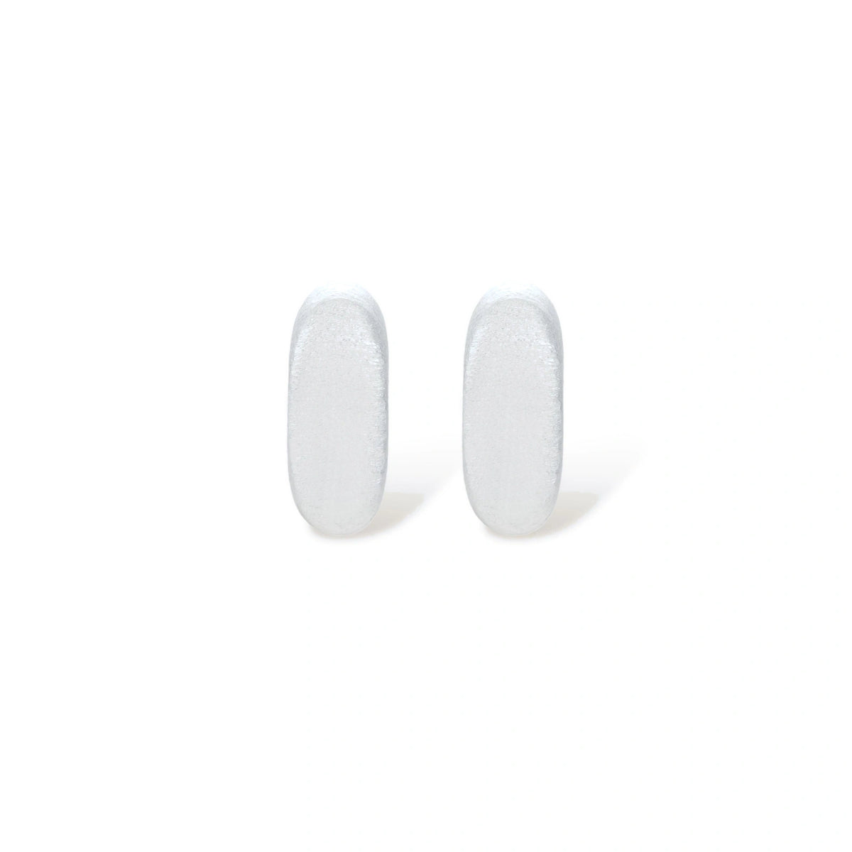 Perrine Silver Huggie Earrings, close-up of brushed finish