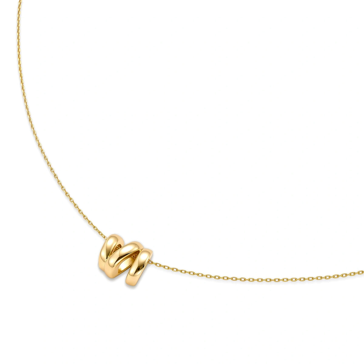 Initial N Necklace, necklace laid at an angle showing the rounded letter N sliding on the chain