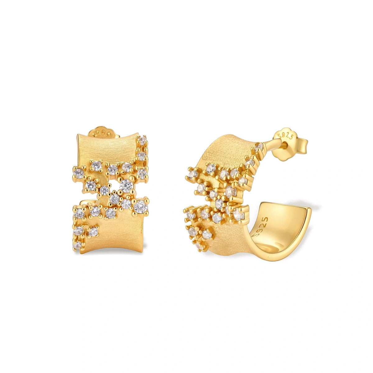 Stella Pavé Hoops, pair of wide brushed gold open hoops with scattered cubic zirconia clusters, one front-on and one turned to show the post