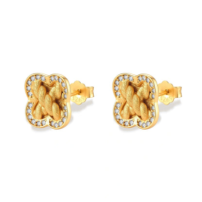 Ines Clover Studs, pair of gold clover studs with cubic zirconia border, angled front view, second angle