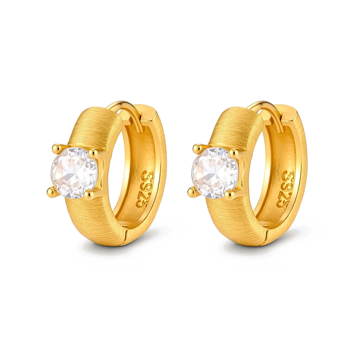 Juno Solitaire Huggies, pair of brushed gold huggie hoops angled to show the S925 stamp inside each hoop
