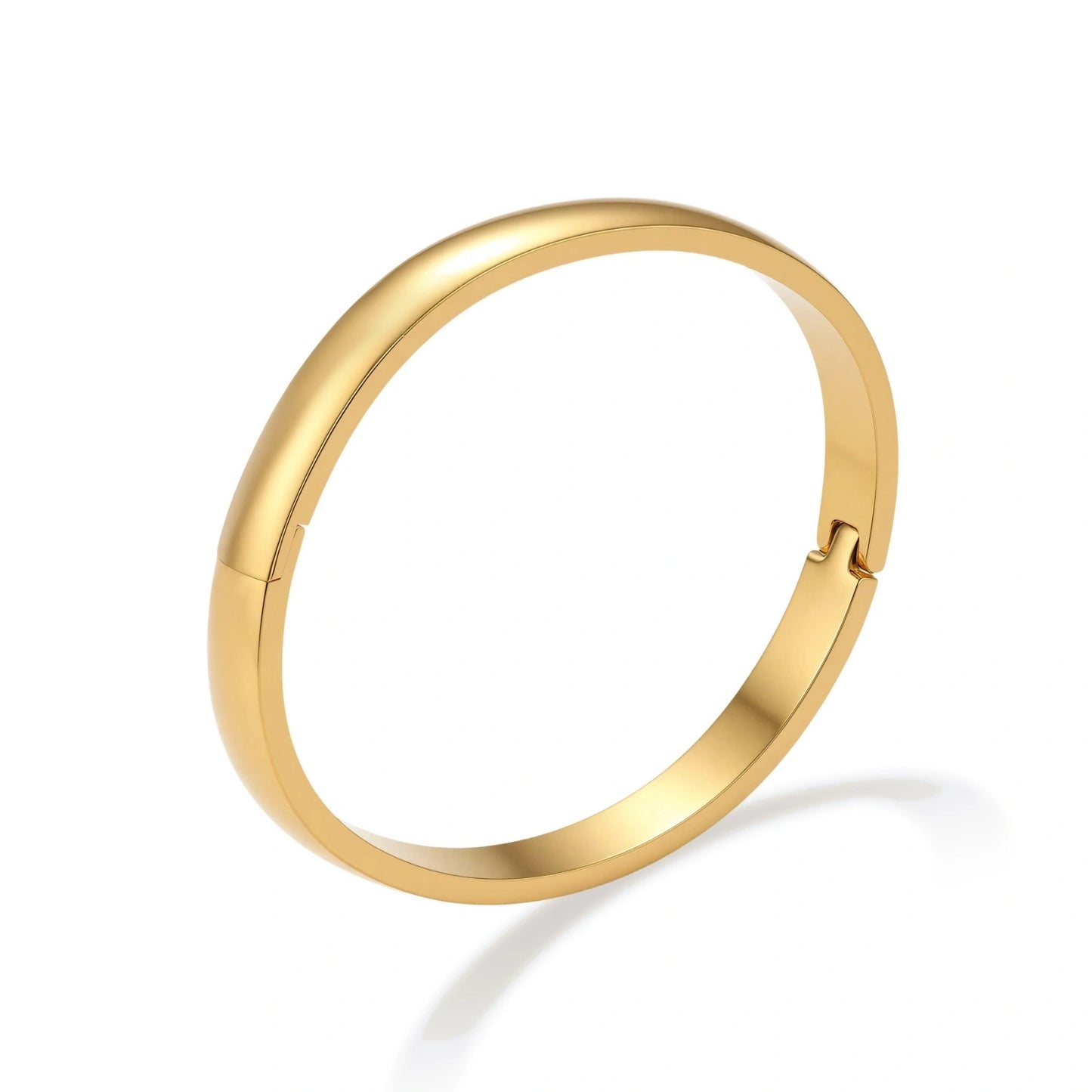 Gold bracelet on a white background