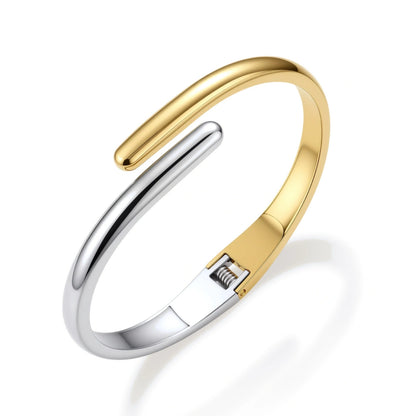 Vesper Bypass Cuff hinged bypass bangle side view showing crossed bands