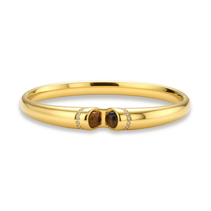 Lucienne Tiger's Eye Bangle, gold-tone hinged bangle with tiger's eye cabochons, front view